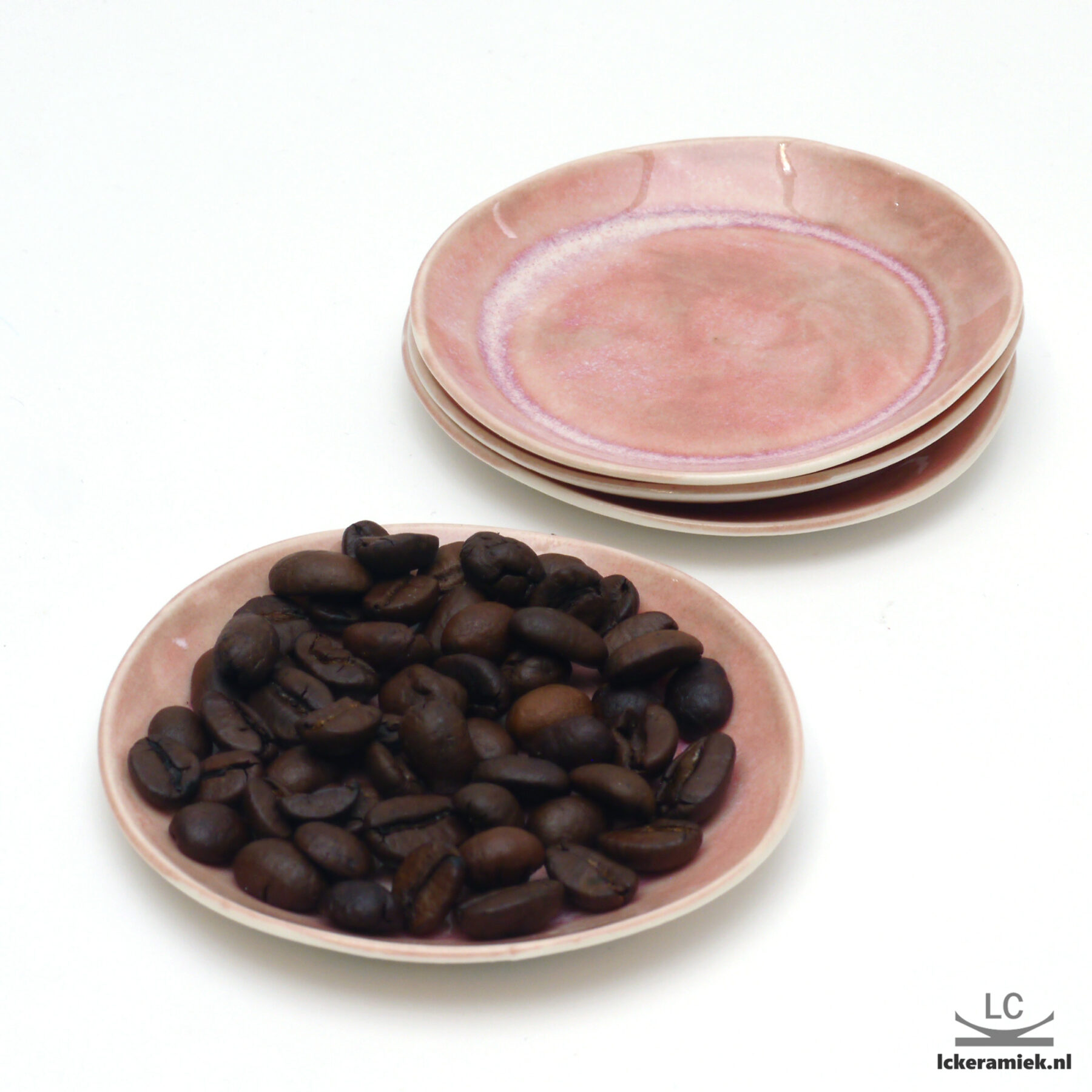 Porseleinen roze bordjes Ø7cm set van 4