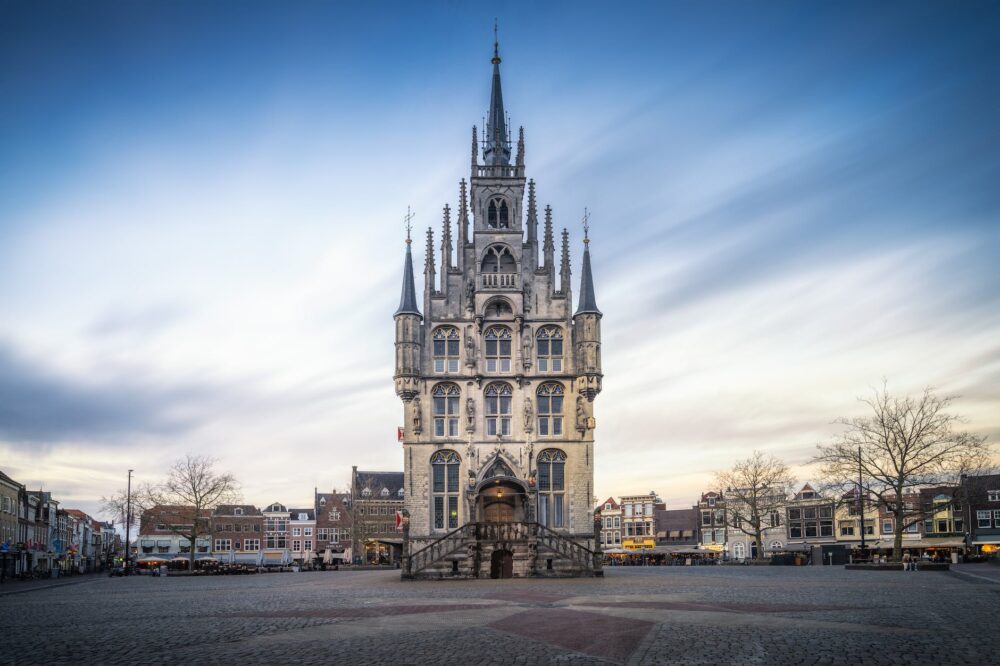 town hall of gouda under the blue sky